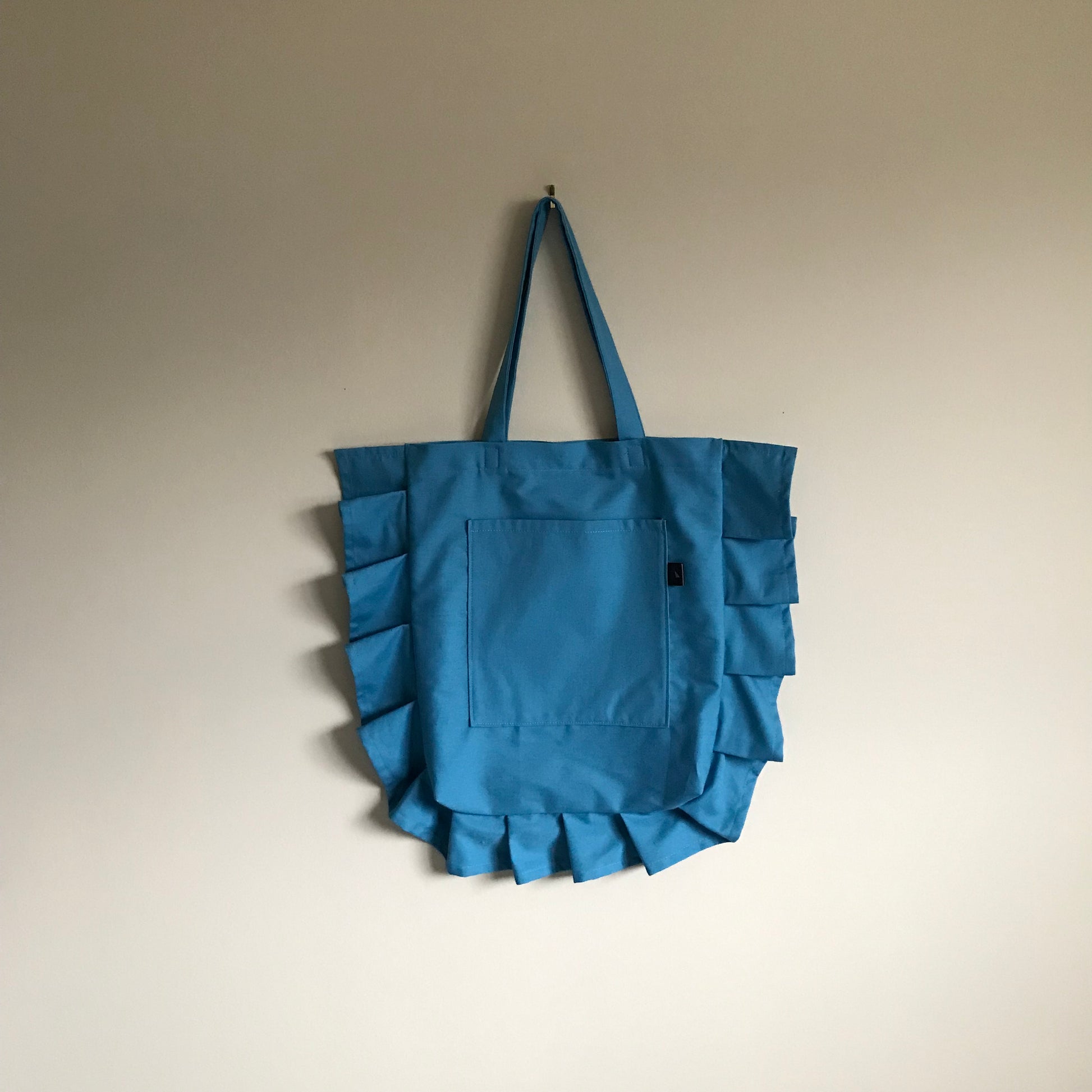 blue ruffle tote bag